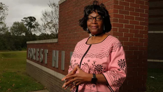 Retired social studies teacher Vera Watson poses for a picture.